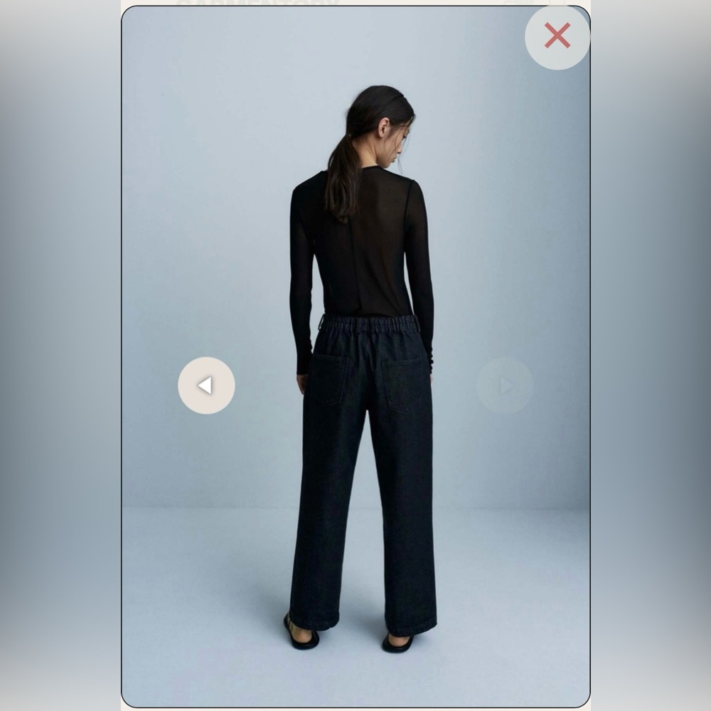 Monica Cordera black straight leg denim.